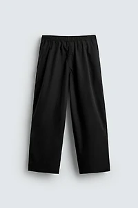 BALLOON FIT PLEATED PANTS