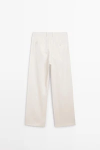 Pleated trousers with crossover fastening - STUDIO