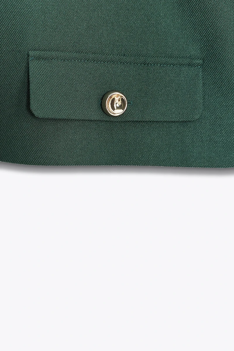 SHORT VEST WITH FLAPS