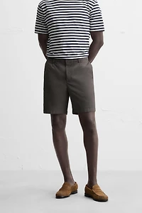 REGULAR FIT PLEATED BERMUDA SHORTS