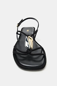 FLAT SANDALS WITH METALLIC APPLIQUÉ