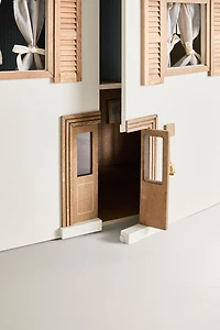 KIDS’ DOLLHOUSE TOY