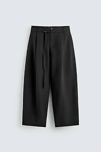 BALLOON FIT PLEATED BELTED PANTS