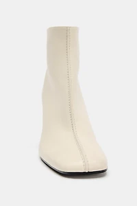 BOTTINES À TALONS EN CUIR LIMITED EDITION