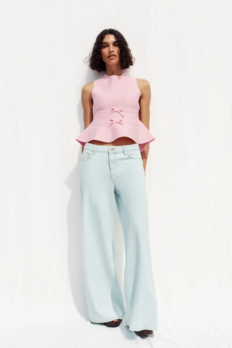 TIE-DETAIL PEPLUM KNIT TOP