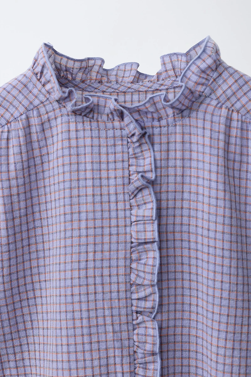 CHEMISE À CARREAUX ET VOLANT