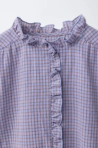 CHEMISE À CARREAUX ET VOLANT