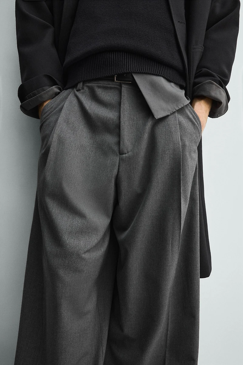 PANTALON COUPE LARGE À PLIS