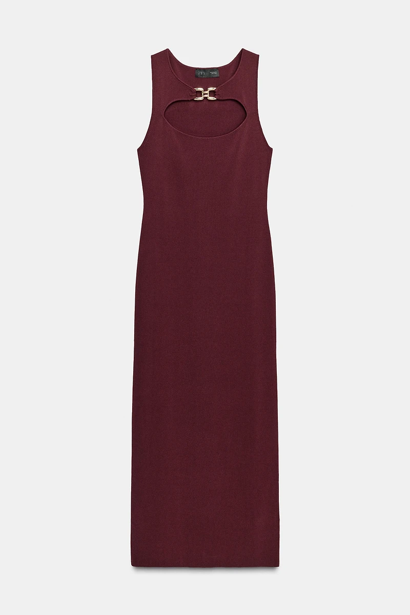 CUT OUT KNIT DRESS WITH METAL DETAIL