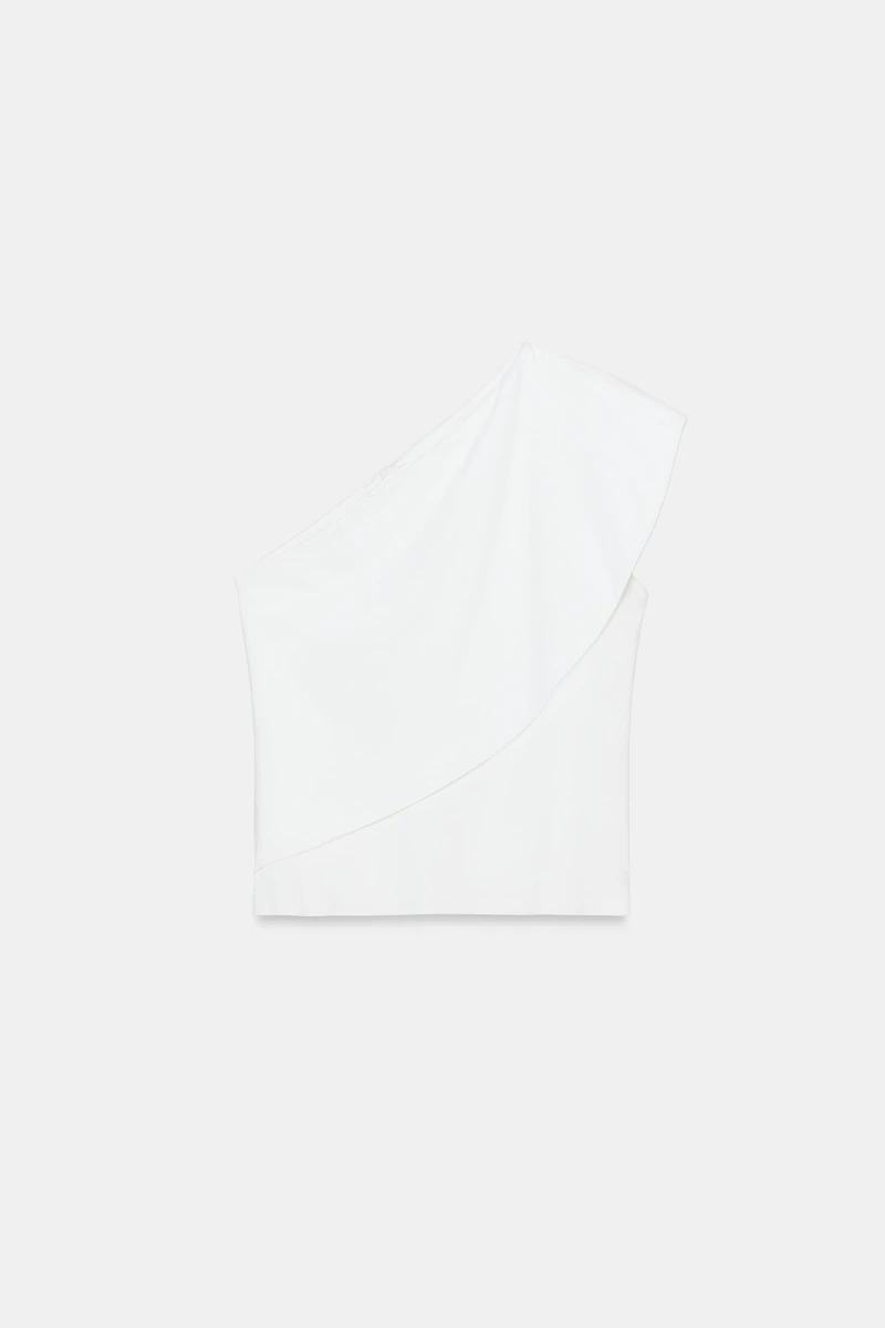 ASYMMETRIC INTERLOCK TOP