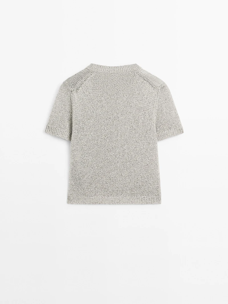 Knit sweater with fabric detail