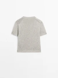 Knit sweater with fabric detail