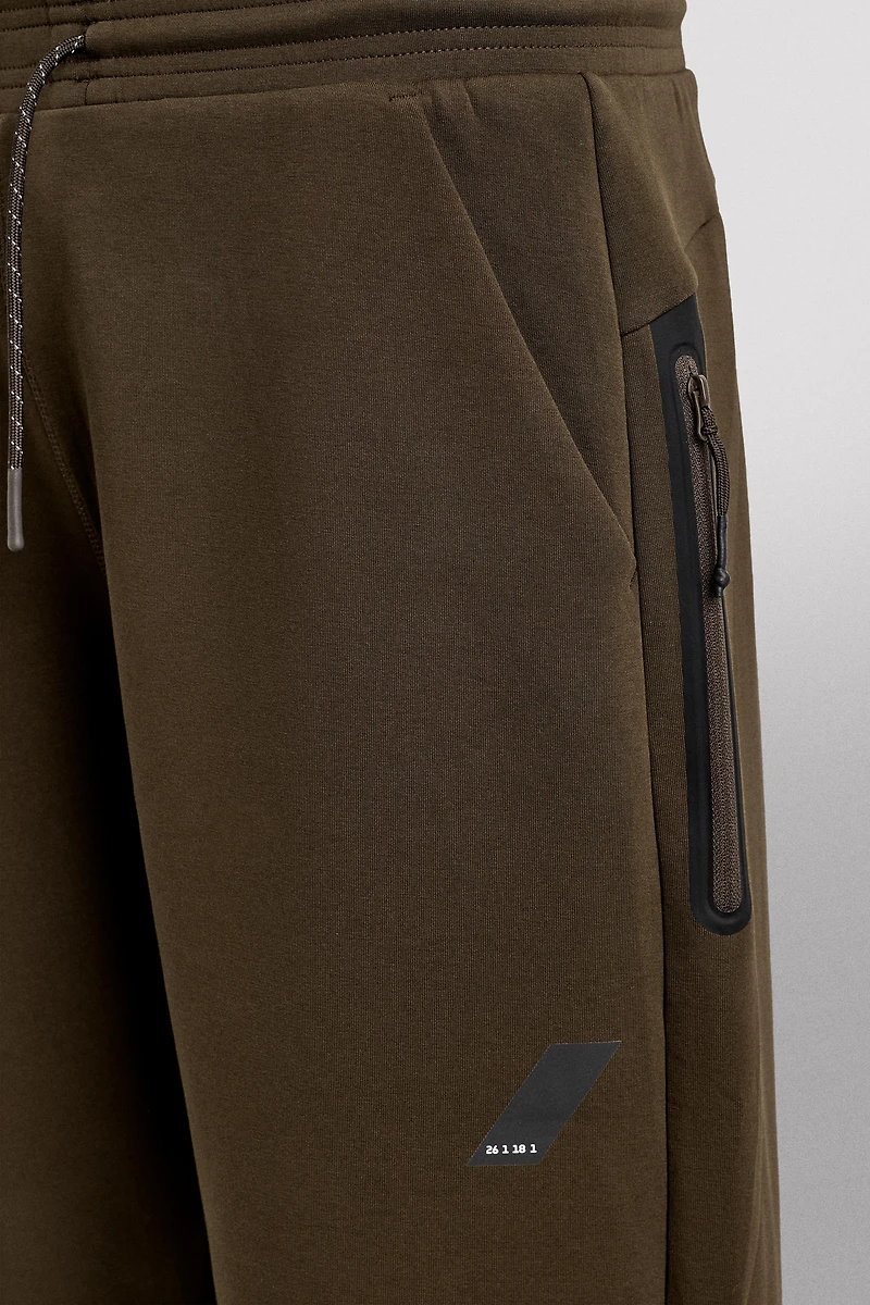 PANTALON TECHNIQUE À FERMETURE ÉCLAIR