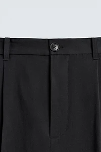 PANTALON STRUCTURÉ À PLIS