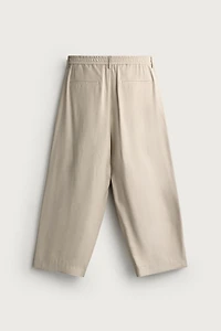 PLEATED RELAXED-FIT PANTS