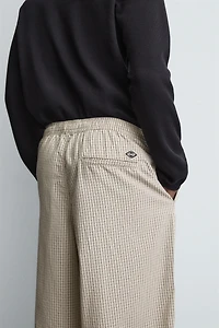 BALLOON FIT PLEATED PANTS