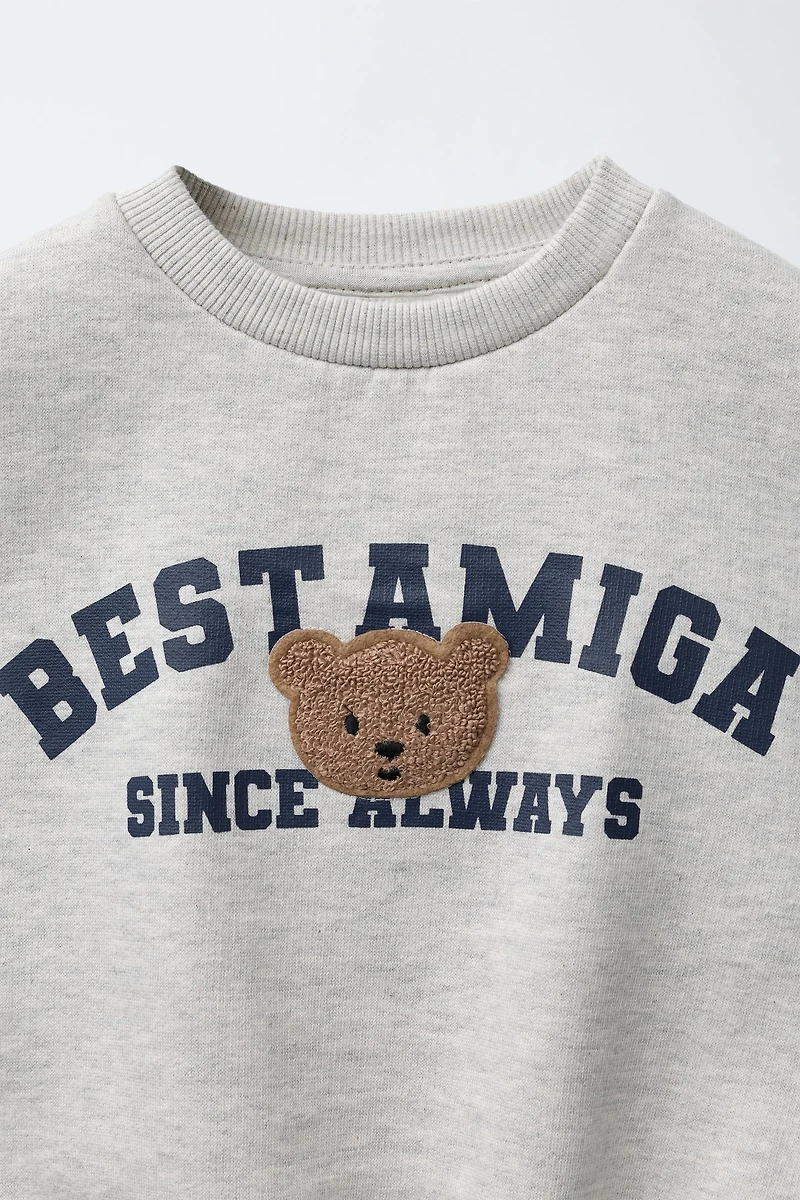 VARSITY TERRY PATCH APPLIQUÉ SWEATSHIRT