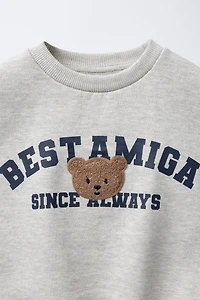 VARSITY TERRY PATCH APPLIQUÉ SWEATSHIRT