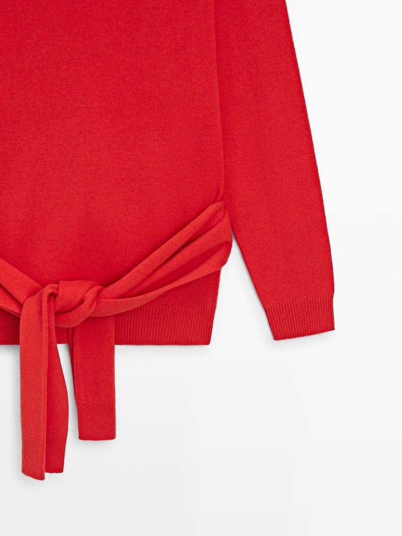 Pull en maille de laine détail taille