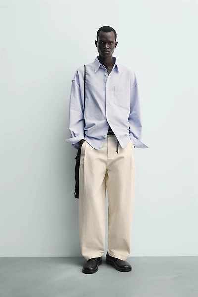 BALLOON FIT PLEATED PANTS