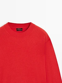 Pull en maille de laine détail taille