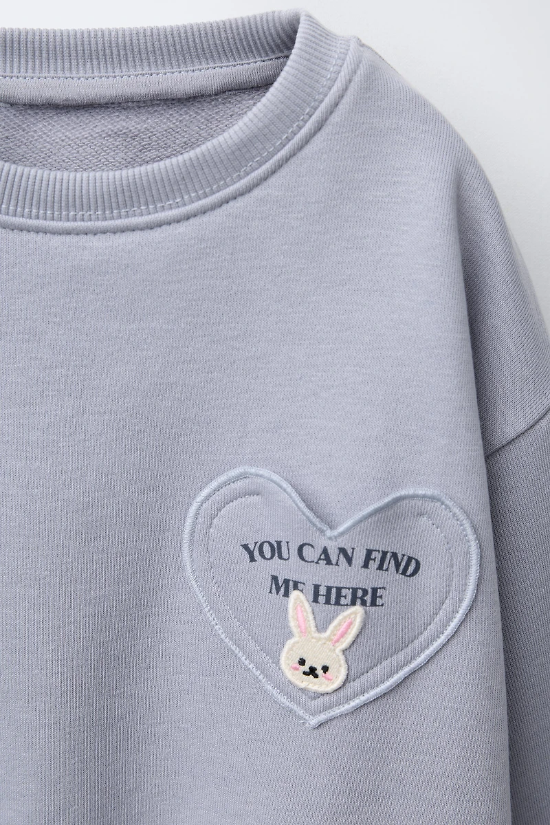 HEART POCKET SWEATSHIRT