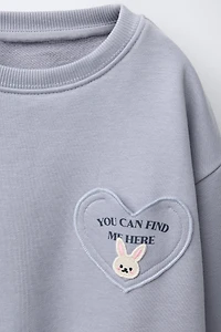HEART POCKET SWEATSHIRT