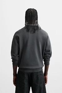 SOFT TEXTURED KNIT SWEATER