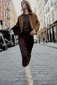 CUT-OUT KNIT MIDI SKIRT