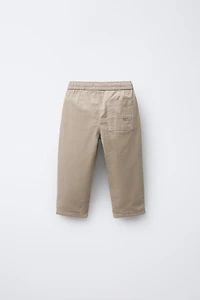 PANTALON EN VELOURS CÔTELÉ FIN DOUBLÉ