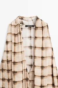 Flowing check print surplice top