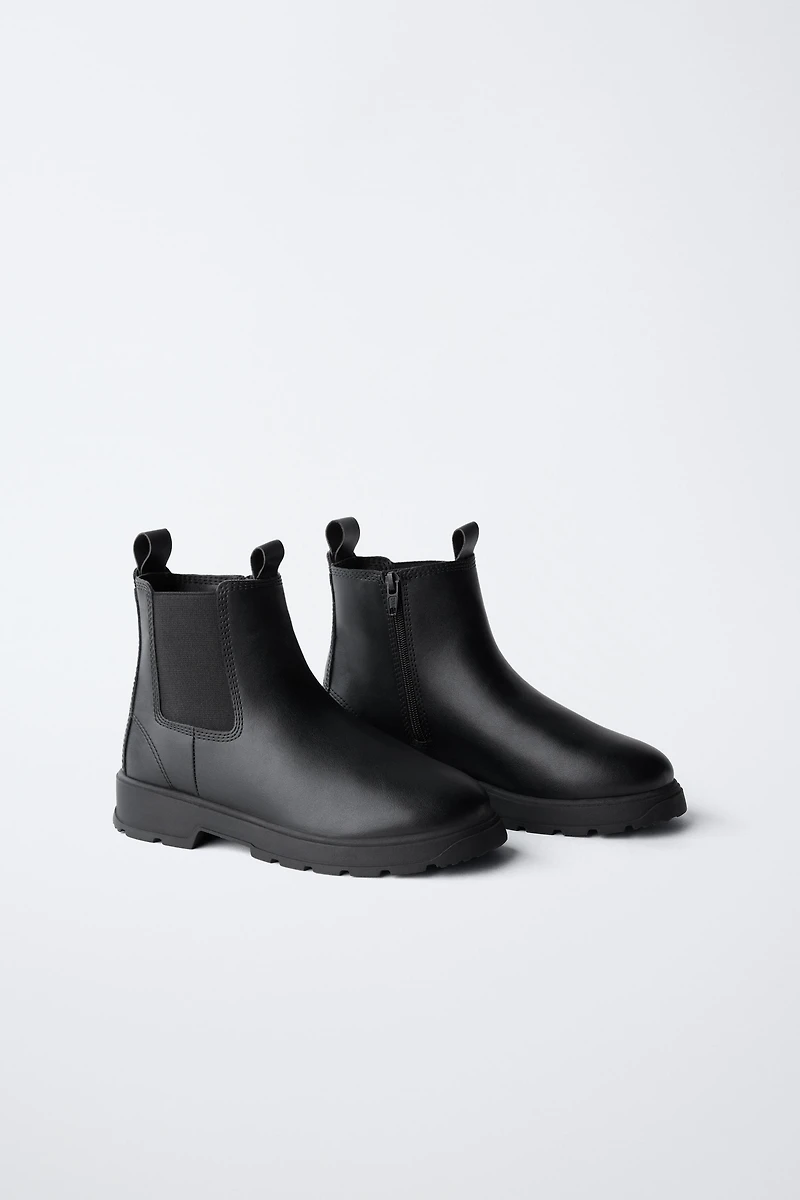 TREADED ANKLE BOOTS