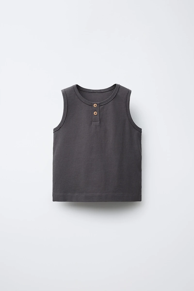 T-SHIRT SANS MANCHES BOUTONS