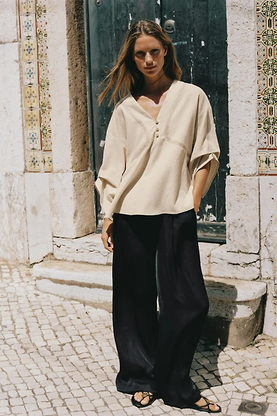 CHEMISE OVERSIZE EN LIN À SURPIQÛRES CONTRASTÉES