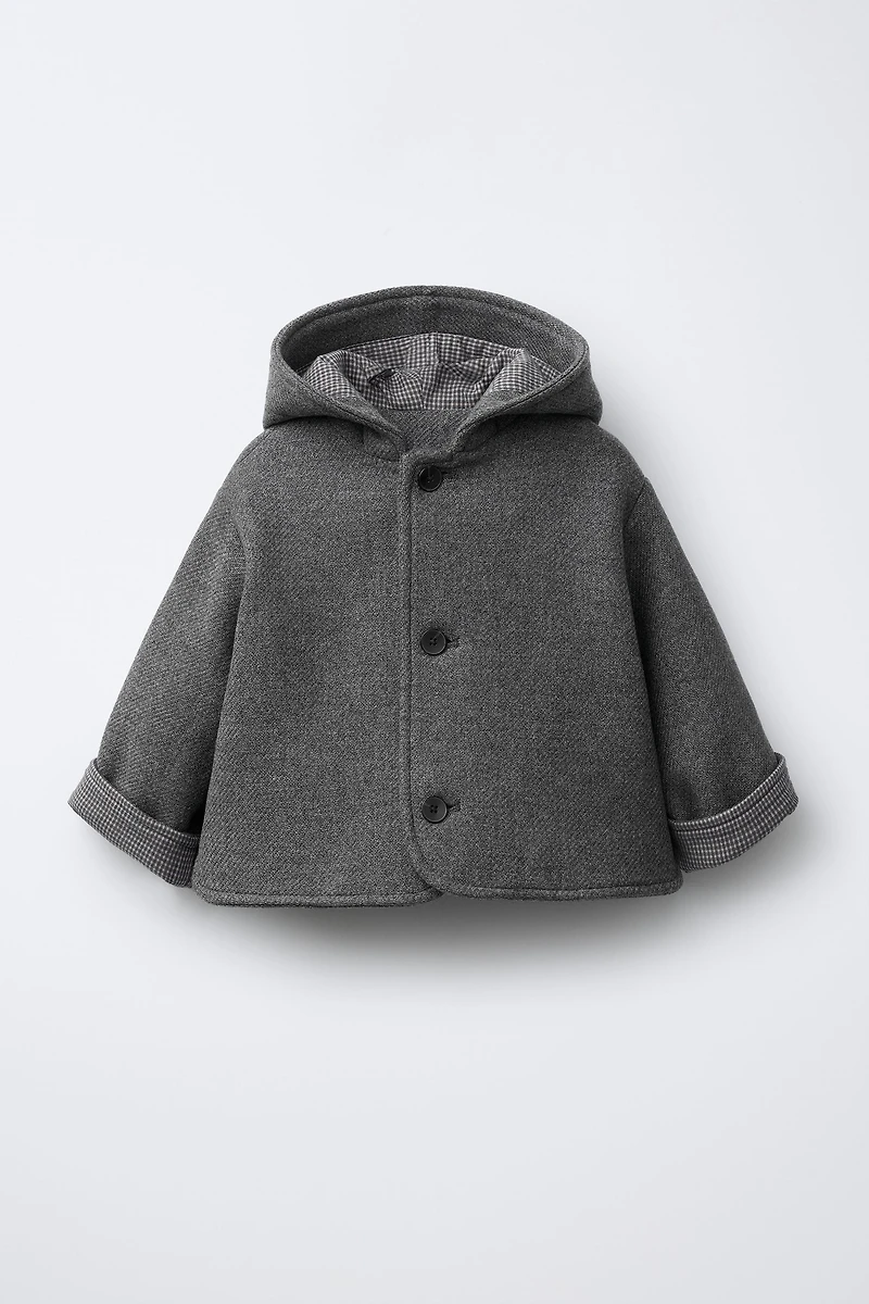 MANTEAU MANTECO À CAPUCHE