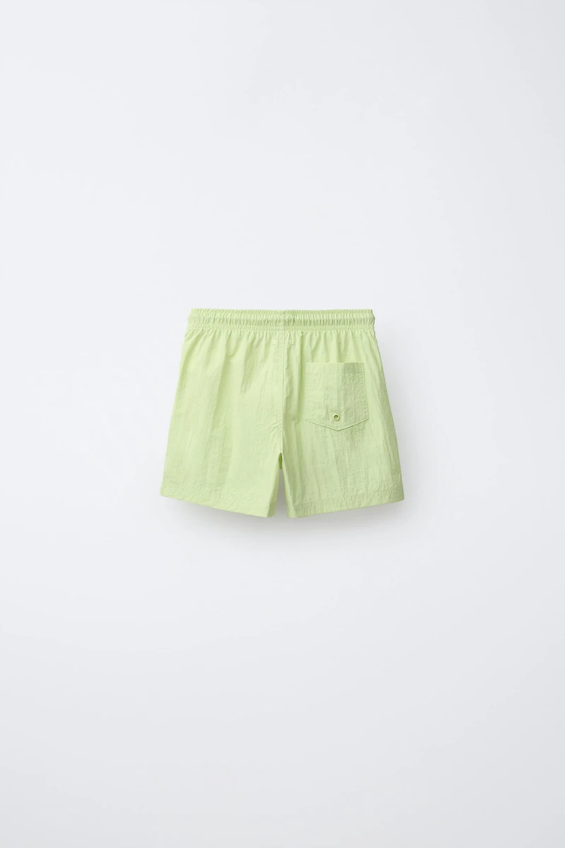 AGES 6-14 / PLAIN SWIM SHORTS