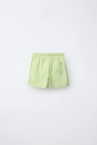 AGES 6-14 / PLAIN SWIM SHORTS