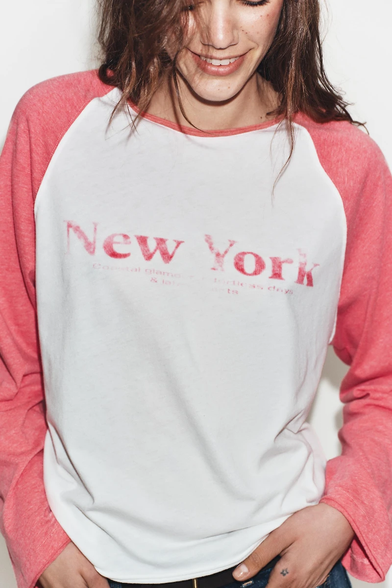 FLAMÉ RAGLAN SLEEVE T-SHIRT