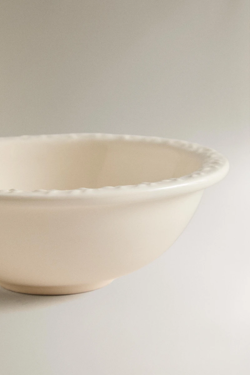 EARTHENWARE BOWL WITH RAISED EDGE