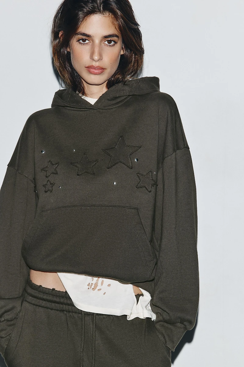 WASHED STAR STUD SWEATSHIRT
