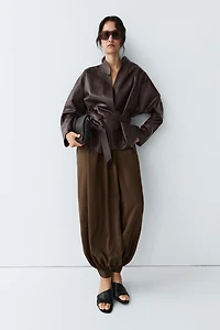 Wrap-front nappa leather jacket with tie detail