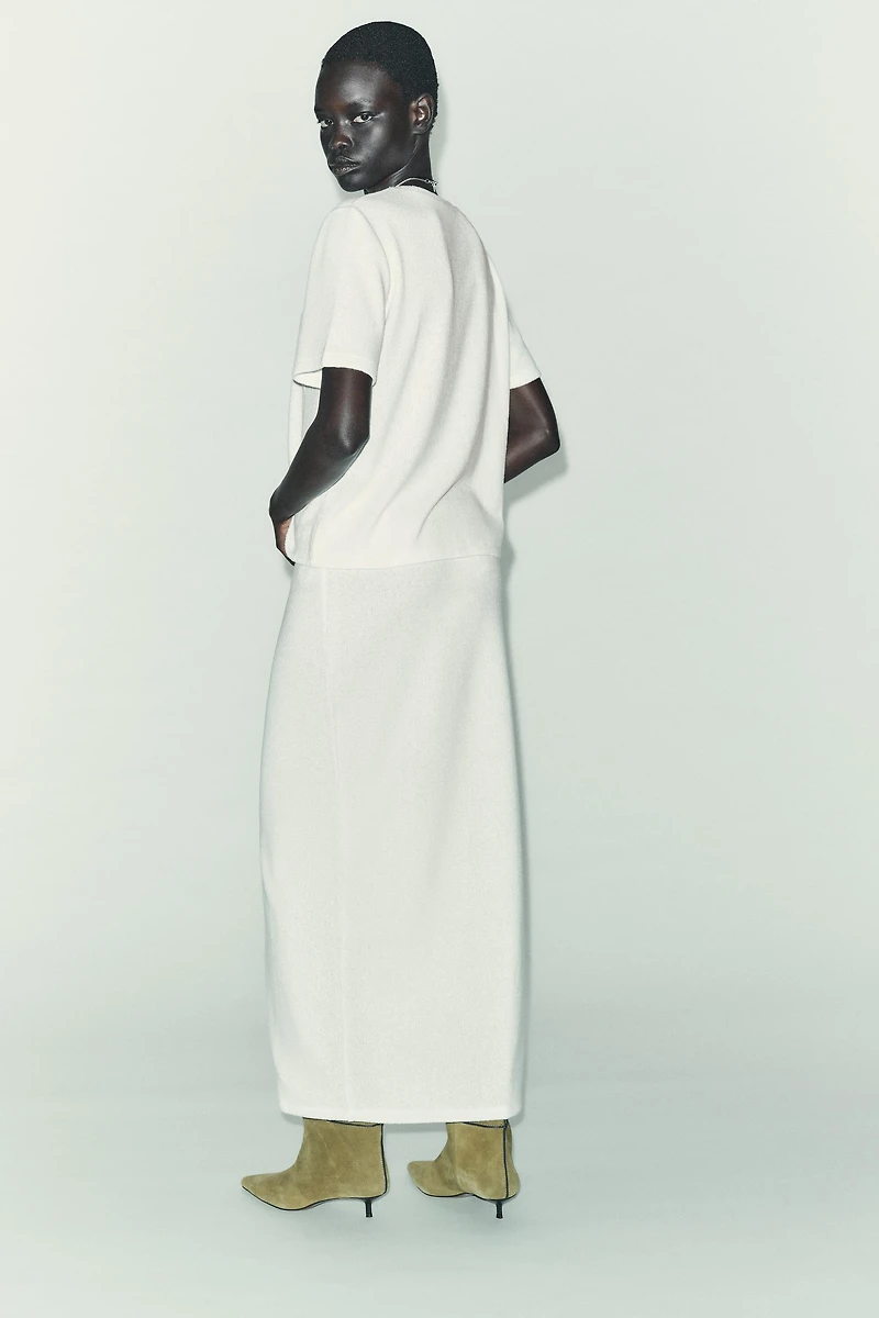 CUT-OUT KNIT MIDI SKIRT