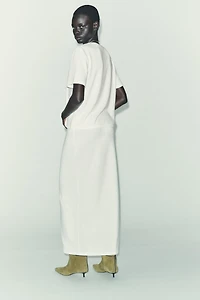 CUT-OUT KNIT MIDI SKIRT