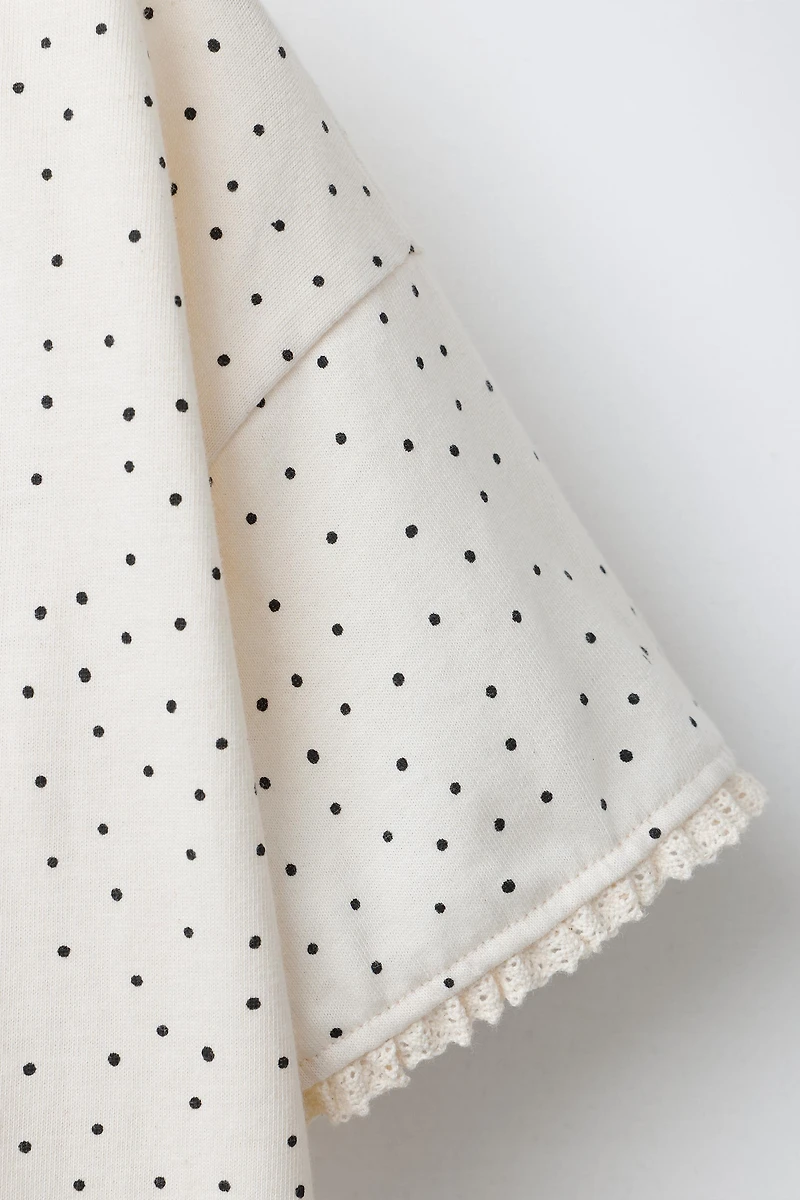 T-SHIRT À POIS ET DENTELLE
