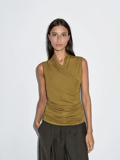 Draped top with surplice neckline