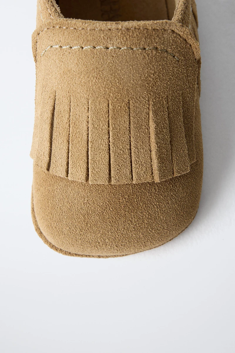 CHAUSSURES EN CUIR