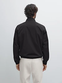 Reversible high neck jacket