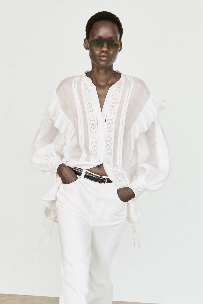 Stand collar blouse with embroidery and ruffles