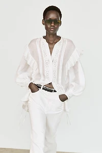 Stand collar blouse with embroidery and ruffles