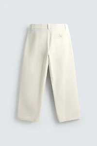 PLEATED WIDE FIT CHINO PANTS